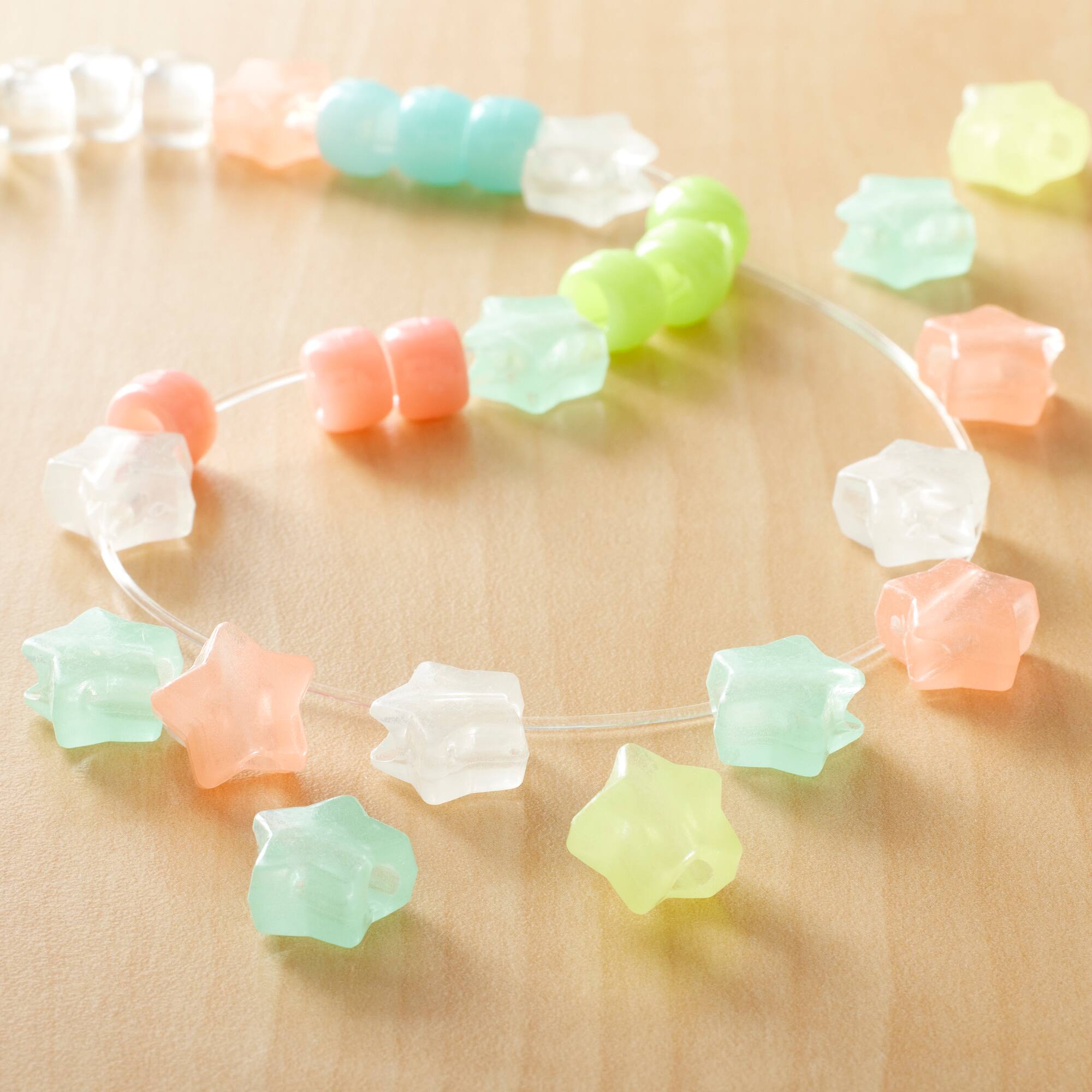12 Packs: 280 ct. (3,360 total) Glow in the Dark Star Beads by Creatology™